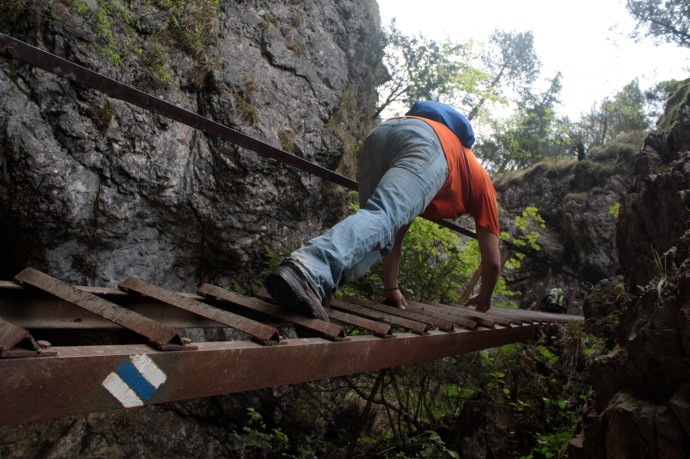Crossing the gorge by ladder.
