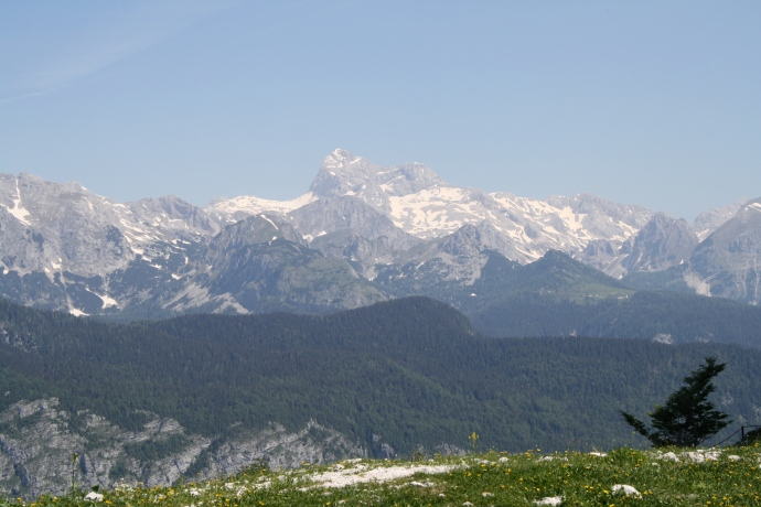 Triglav, Slovenia's highest peak, shows itself across the valley.
